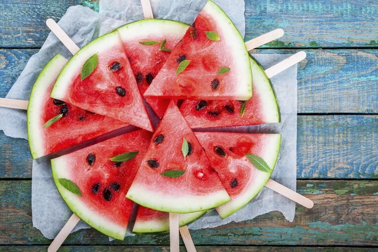 Slices of watermelon on snack sticks on a watermelon diet